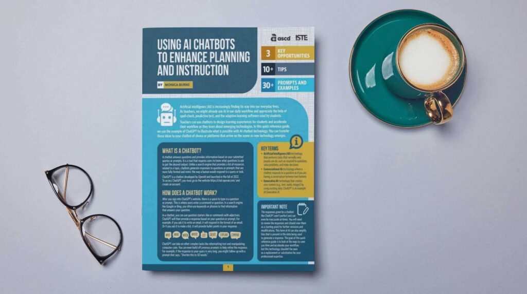 A neatly arranged desk featuring Monica Burns' new quick reference guide on AI chatbots, positioned next to a steaming cup of coffee and a pair of glasses, implying a focused and thoughtful learning environment.